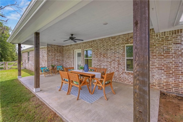 9868 Albert Dr, Iola, TX 77861 - view of patio / terrace featuring a ceiling fan and outdoor dining space
