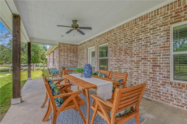 9868 Albert Dr, Iola, TX 77861 - view of patio / terrace featuring outdoor dining area and ceiling fan