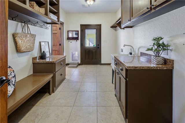 interior space featuring light tile patterned flooring