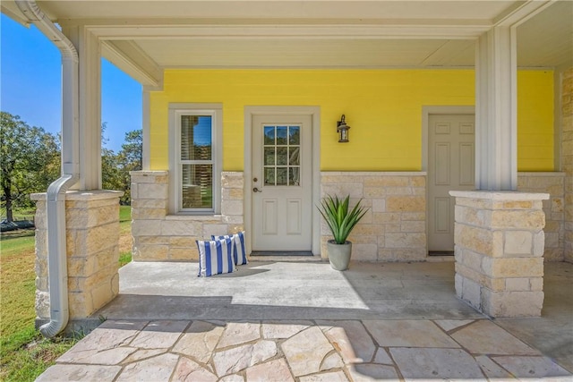 entrance to property with covered porch