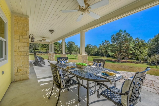 view of patio featuring ceiling fan