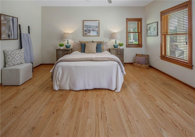 bedroom with light hardwood / wood-style flooring