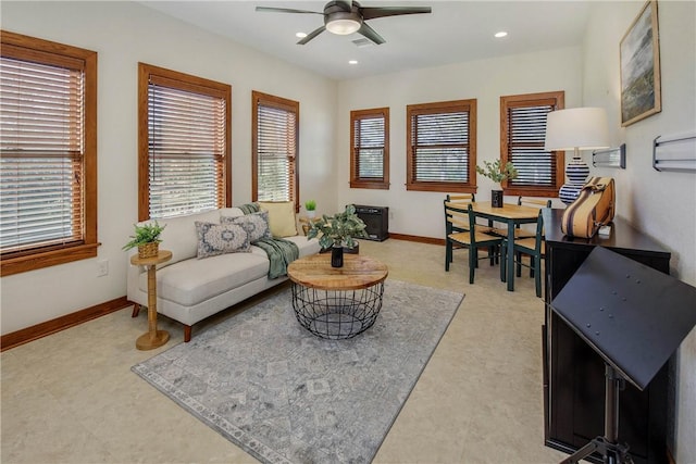 living room featuring ceiling fan