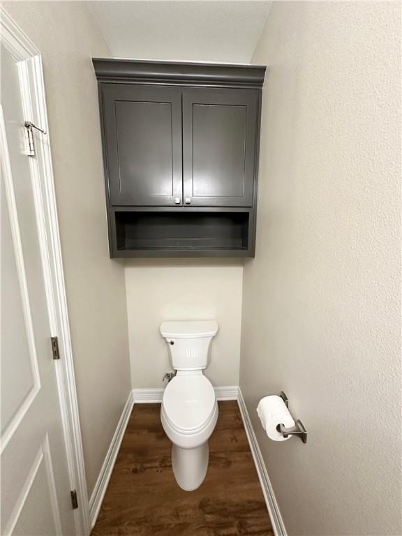 114 Hayes Church Rd, Franklin, TX 77856 - bathroom with wood finished floors and baseboards
