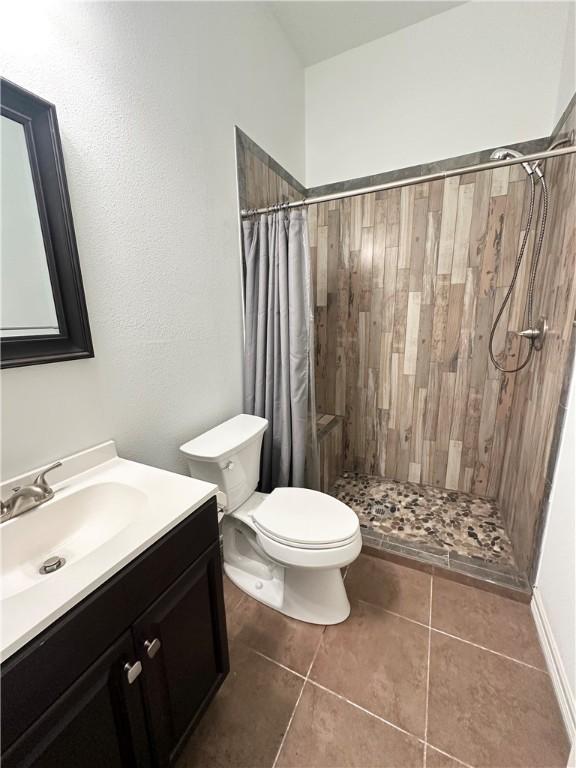 114 Hayes Church Rd, Franklin, TX 77856 - bathroom featuring vanity, a shower stall, and tile patterned floors