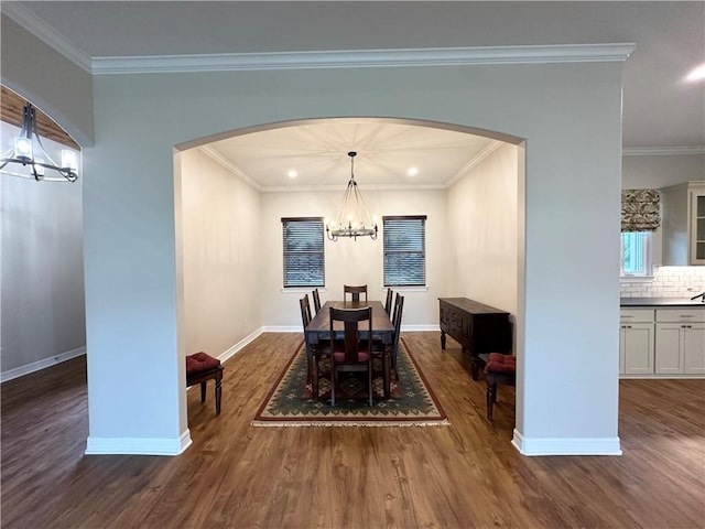 114 Hayes Church Rd, Franklin, TX 77856 - dining area with a chandelier, dark wood-style flooring, arched walkways, crown molding, and recessed lighting
