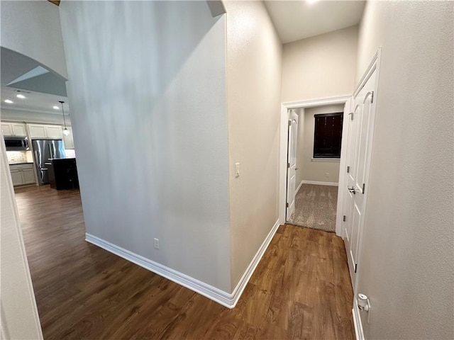 114 Hayes Church Rd, Franklin, TX 77856 - hall featuring arched walkways, dark wood-type flooring, and recessed lighting