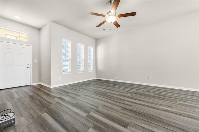 entrance foyer with ceiling fan and dark hardwood / wood-style flooring