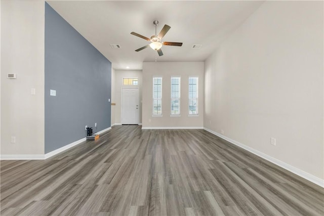 interior space featuring ceiling fan and wood-type flooring