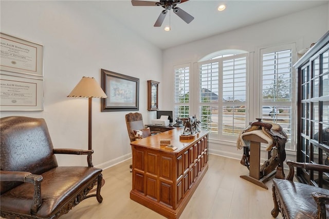 office space featuring recessed lighting, light wood-type flooring, and baseboards