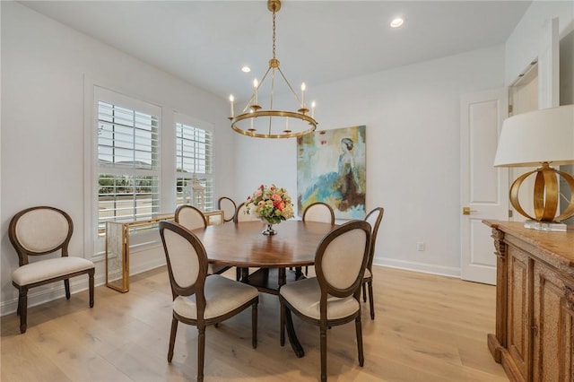 dining area with recessed lighting, a notable chandelier, light wood-style flooring, and baseboards