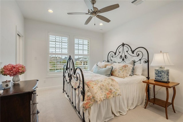 bedroom featuring ceiling fan, recessed lighting, light colored carpet, visible vents, and baseboards