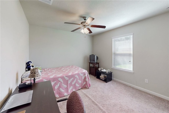 2515 Warkworth Ln, College Station, TX 77845 - bedroom with carpet flooring, baseboards, and ceiling fan