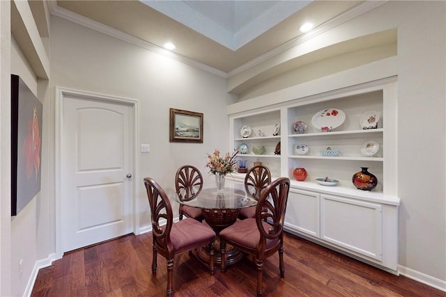 2515 Warkworth Ln, College Station, TX 77845 - dining area featuring ornamental molding, dark wood finished floors, baseboards, and built in features