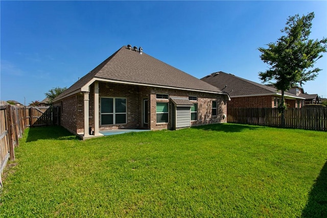2515 Warkworth Ln, College Station, TX 77845 - rear view of property with brick siding, a patio, and roof with shingles