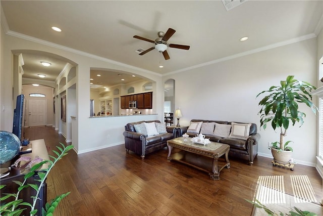 2515 Warkworth Ln, College Station, TX 77845 - living room featuring arched walkways, a ceiling fan, dark wood-style floors, baseboards, and recessed lighting