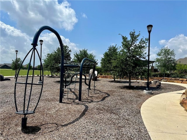 view of home's community with playground community