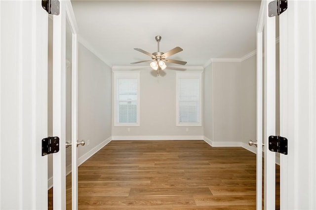 5012 Grayson Way, Bryan, TX 77802 - empty room featuring crown molding, french doors, ceiling fan, and light wood-style flooring