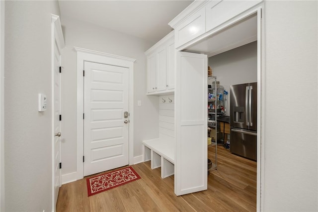 mudroom featuring light wood-style flooring