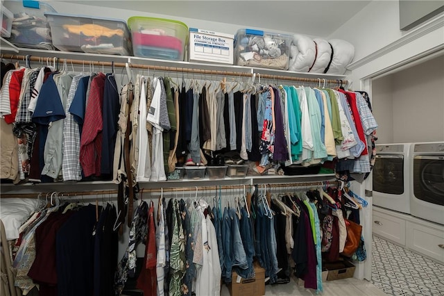 spacious closet with separate washer and dryer