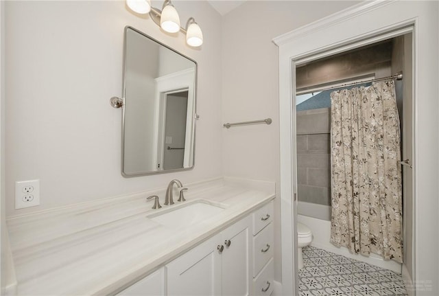 full bath featuring vanity, tile patterned floors, shower / bath combo with shower curtain, and toilet