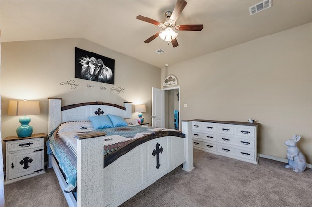 carpeted bedroom featuring ceiling fan and vaulted ceiling