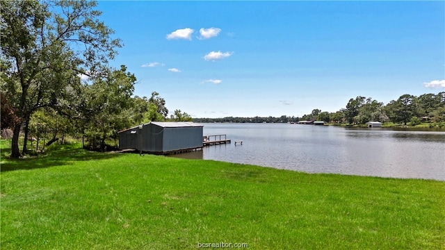 exterior space featuring a water view and a boat dock