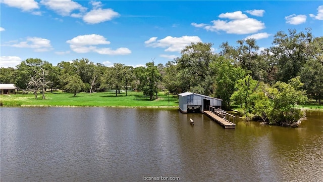 view of water feature with a dock