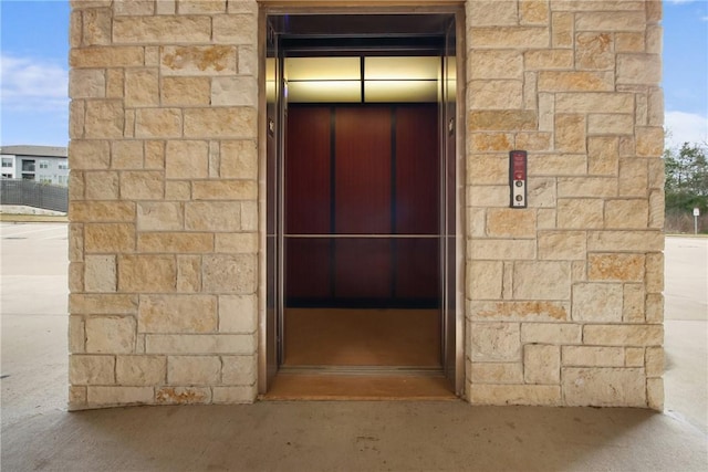 view of exterior entry featuring elevator