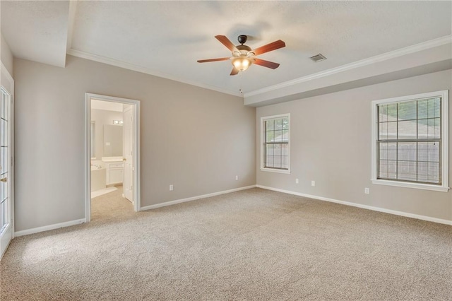 4213 Bedford Ct, Bryan, TX 77802 - empty room featuring crown molding, carpet floors, and a ceiling fan