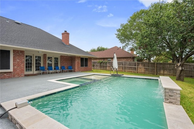 4213 Bedford Ct, Bryan, TX 77802 - view of swimming pool with french doors, a patio area, a fenced backyard, and a pool with connected hot tub