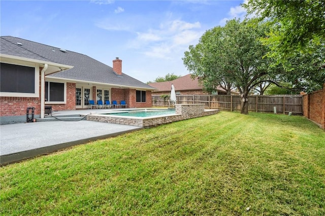 4213 Bedford Ct, Bryan, TX 77802 - fenced backyard featuring a patio area and french doors