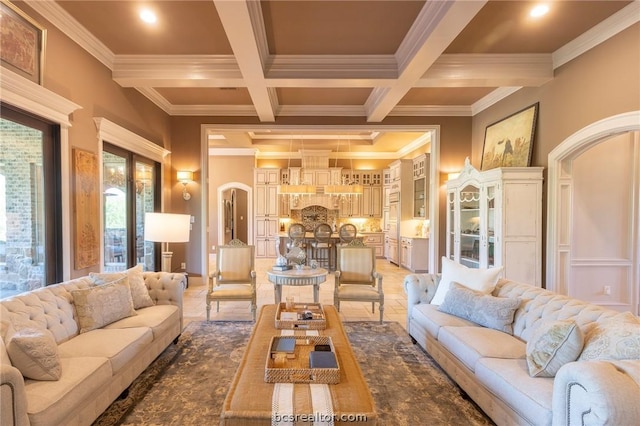 living room with beamed ceiling, coffered ceiling, and ornamental molding