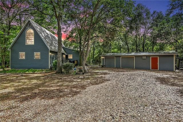 view of property exterior at dusk