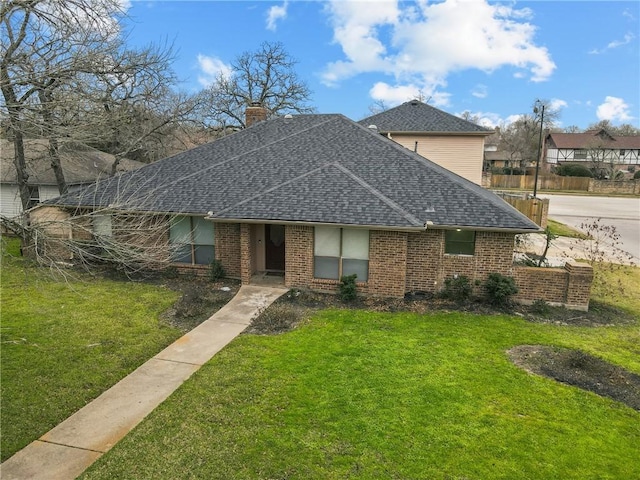 view of front of home with a front lawn