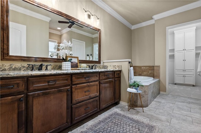 5104 Stonewater Loop, College Station, TX 77845 - bathroom featuring double vanity, crown molding, a bath, ceiling fan, and a closet
