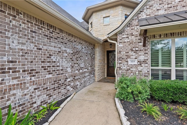 5104 Stonewater Loop, College Station, TX 77845 - view of exterior entry featuring brick siding