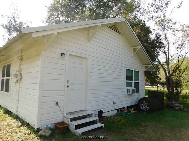 1117 Sycamore St, Navasota, TX 77868 - view of side of property featuring entry steps and cooling unit