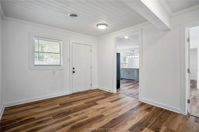 entryway with wooden ceiling, hardwood / wood-style flooring, crown molding, and a notable chandelier