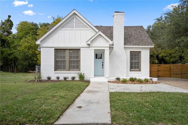 view of front of home with a front yard