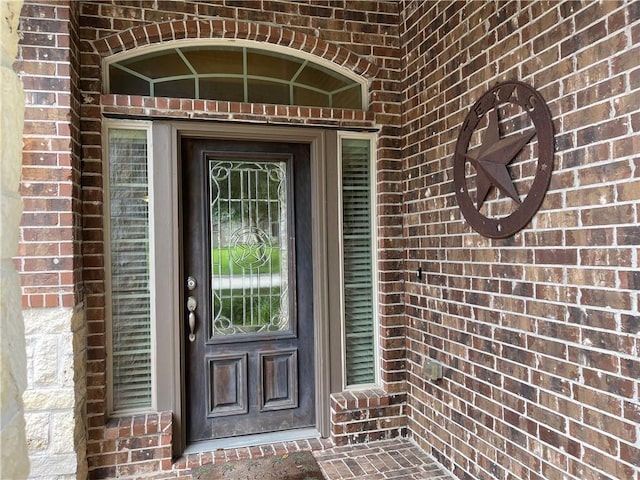 2406 Winter Trail Dr, Conroe, TX 77304 - view of exterior entry with brick siding