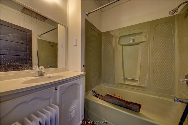 803 Holland St, Navasota, TX 77868 - bathroom featuring washtub / shower combination and vanity