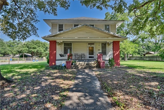 803 Holland St, Navasota, TX 77868 - view of front of house with a front lawn and a porch