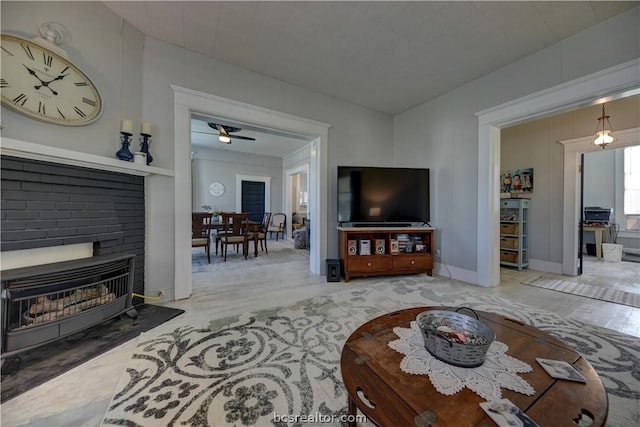 803 Holland St, Navasota, TX 77868 - living room with a fireplace and ceiling fan