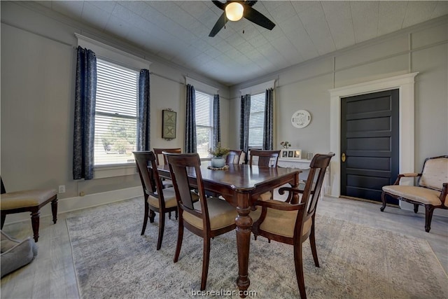 803 Holland St, Navasota, TX 77868 - dining room featuring ceiling fan, light hardwood / wood-style floors, and ornamental molding