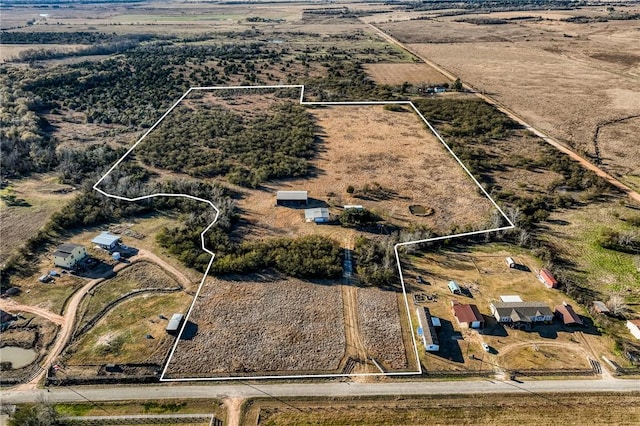 birds eye view of property featuring a rural view