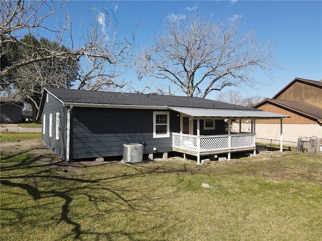 407 N Amthor St, Bellville, TX 77418 - back of property featuring a lawn and central air condition unit