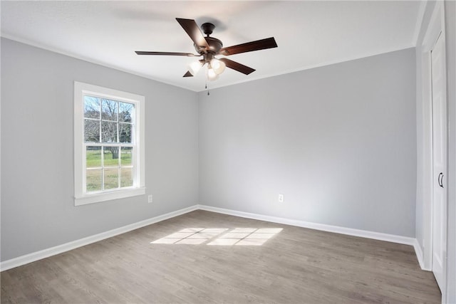 407 N Amthor St, Bellville, TX 77418 - spare room featuring wood-type flooring and ceiling fan