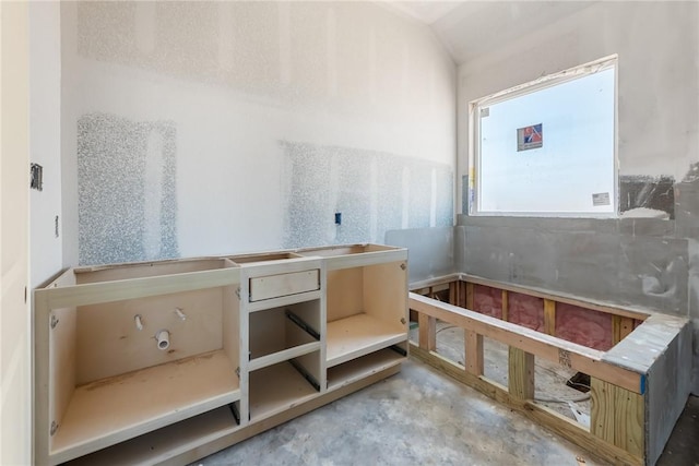 bathroom featuring concrete floors