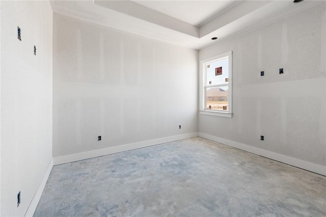 empty room with a tray ceiling